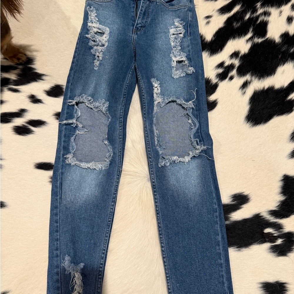 Distressed Blue Jeans